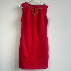 Red business dress for the modern woman